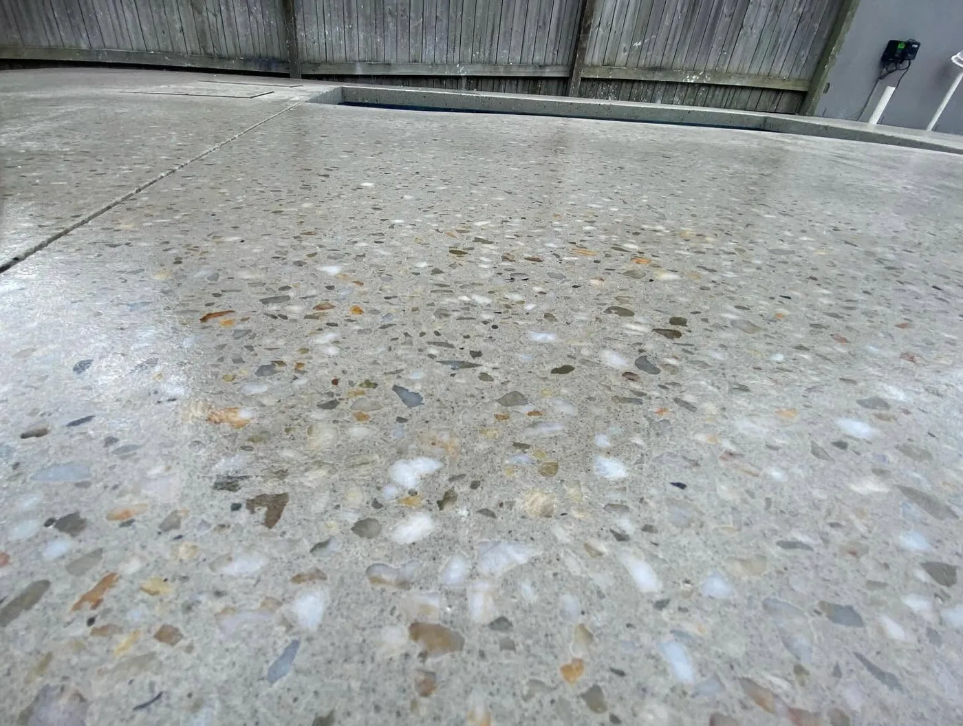 Close-up detail of an exposed aggregate concrete finish