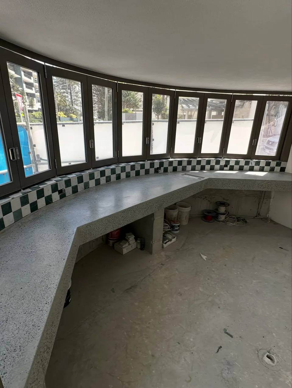 Polished, patched and sealed concrete benchtop by Frenchys Flooring
